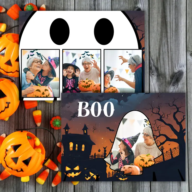 2 Halloween ghost photo cards slightly overlapping on a table with Halloween candy and decor. The cards feature 4 festive photos. One has 3 photos in front of a ghost close up. One has a photo in the shape of a ghost and says boo with a spooky scene.
