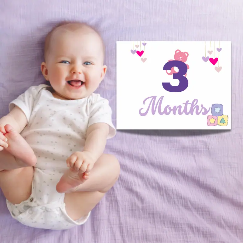 A laughing baby laying on a purple sheet with a milestone sign beside them that says 3 months and features a pink teddy bear and soft colored blocks. The card showcases complimentary shades of purple.
