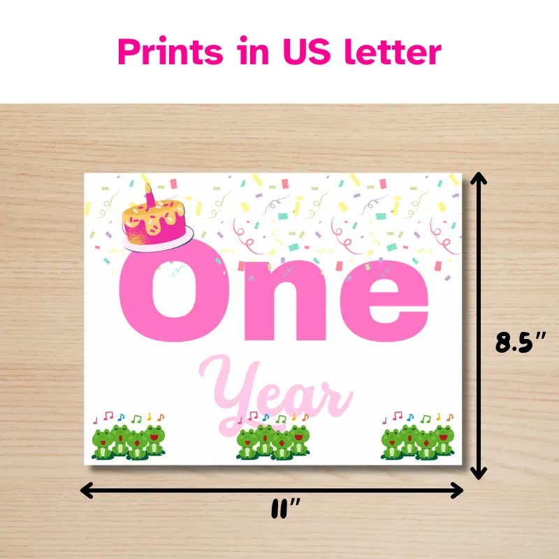 A baby milestone sign that says one year in complimentary shades of pink and features 12 singing frogs, a cake with one candle and confetti with lines beside it indicating it will print in 11 x 8.5 inches