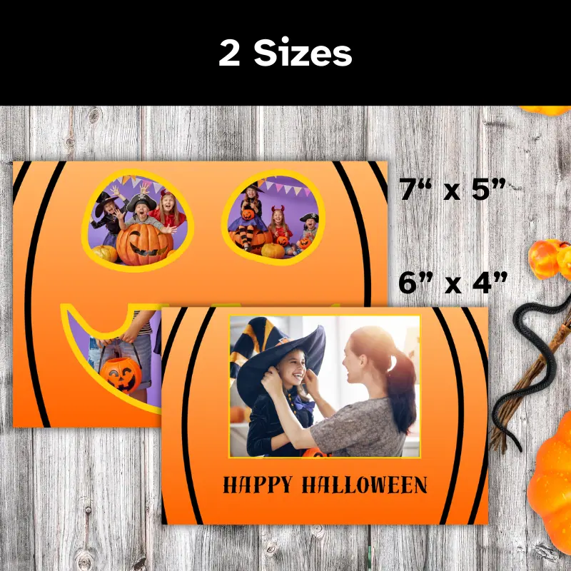 2 orange Halloween photo cards slightly overlapping on a table with Halloween candy and decor. The cards feature 4 photos of children. 3 photos form the shape of a jack o lantern face one the front and there is a large photo on the back shown in 2 sizes, 7 x 5 and 6 x 4 inches.