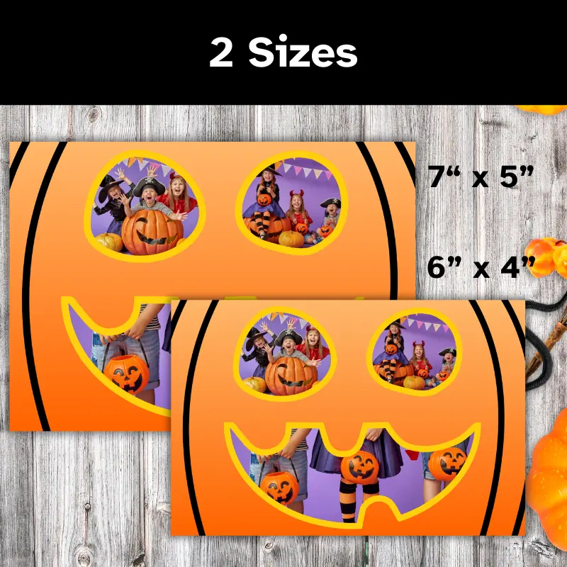 2 of the same Halloween photo cards slightly overlapping on a table. The cards feature 3 photos of children. The photos form the shape of a jack o lantern face. One card is 7 x 5 inches and one is 6 x 4 inches.