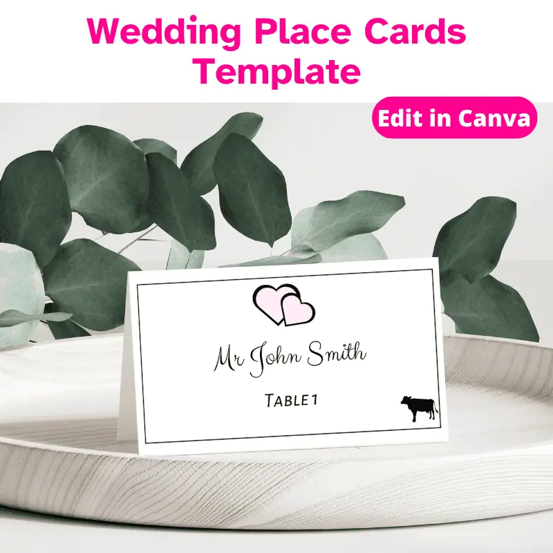 A wedding place card that says Mr. John Smith Table 1 and the picture of a cow in the bottom right corner