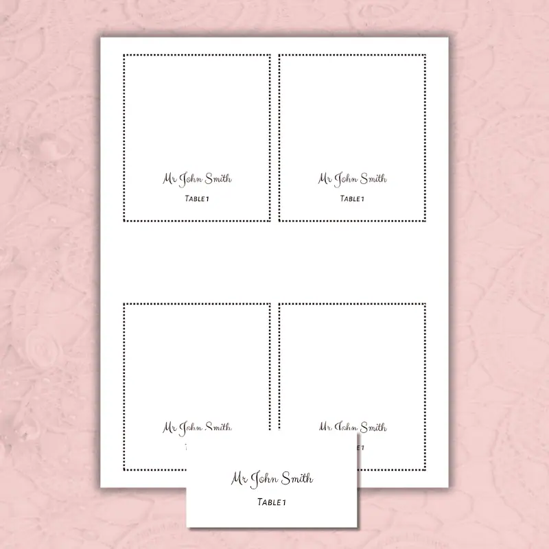 a folded and a flat wedding place card printable with a plain white background on a table.