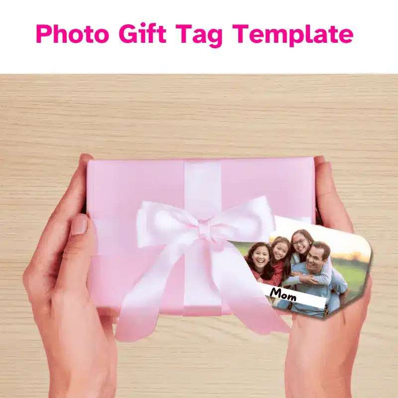 someone holding a pink package with a gift tag that says mom. The printed gift tag has a family photo on it.